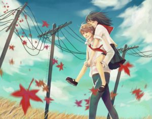 boy holding girl on his back