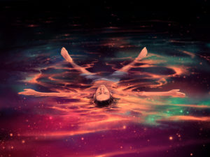 man swimming in water