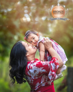 mother holding baby