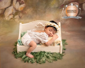 baby sleepingon cradle bed